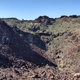 Aden Crater is indeed a larger hole in the ground. Call it maybe 1/4 mile across rim to rim.